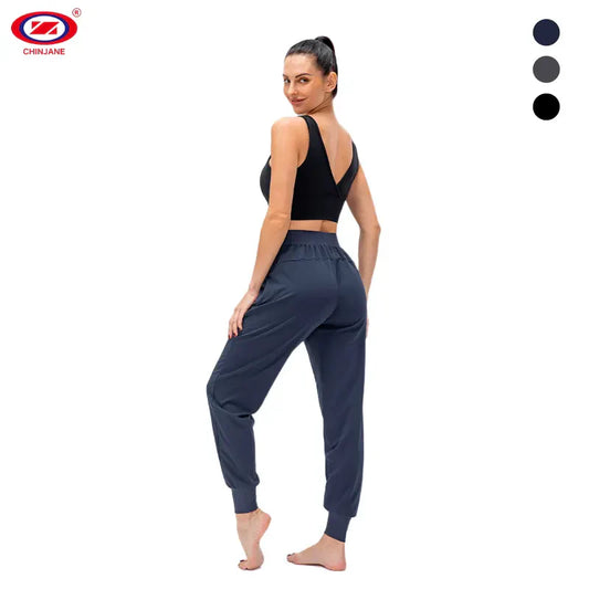 Women's loose sweatpants drawstring leg restraints casual outdoor running hiking breathable quick dry fitness